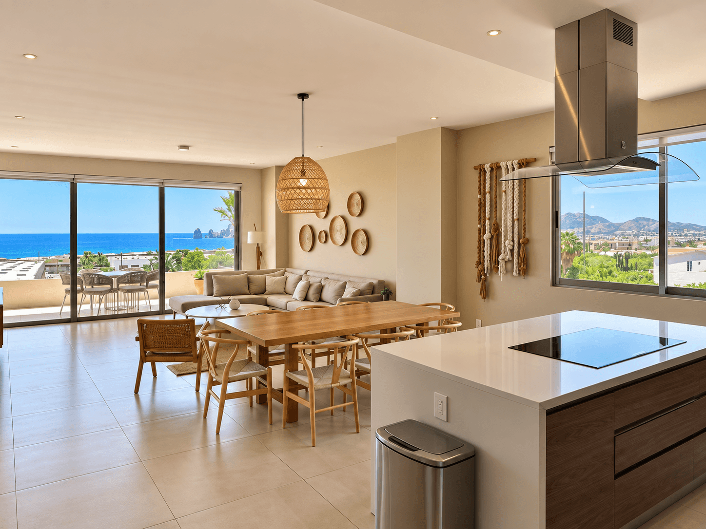 Living room, dining area and kitchen with Arch views.