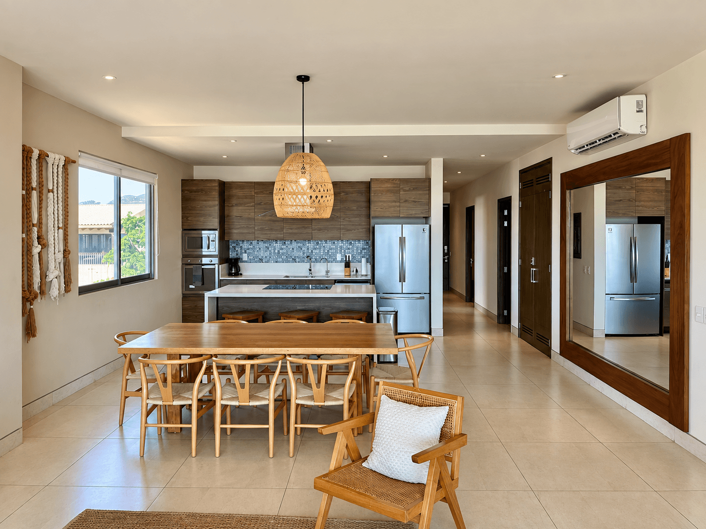 Dining area with modern kitchen.