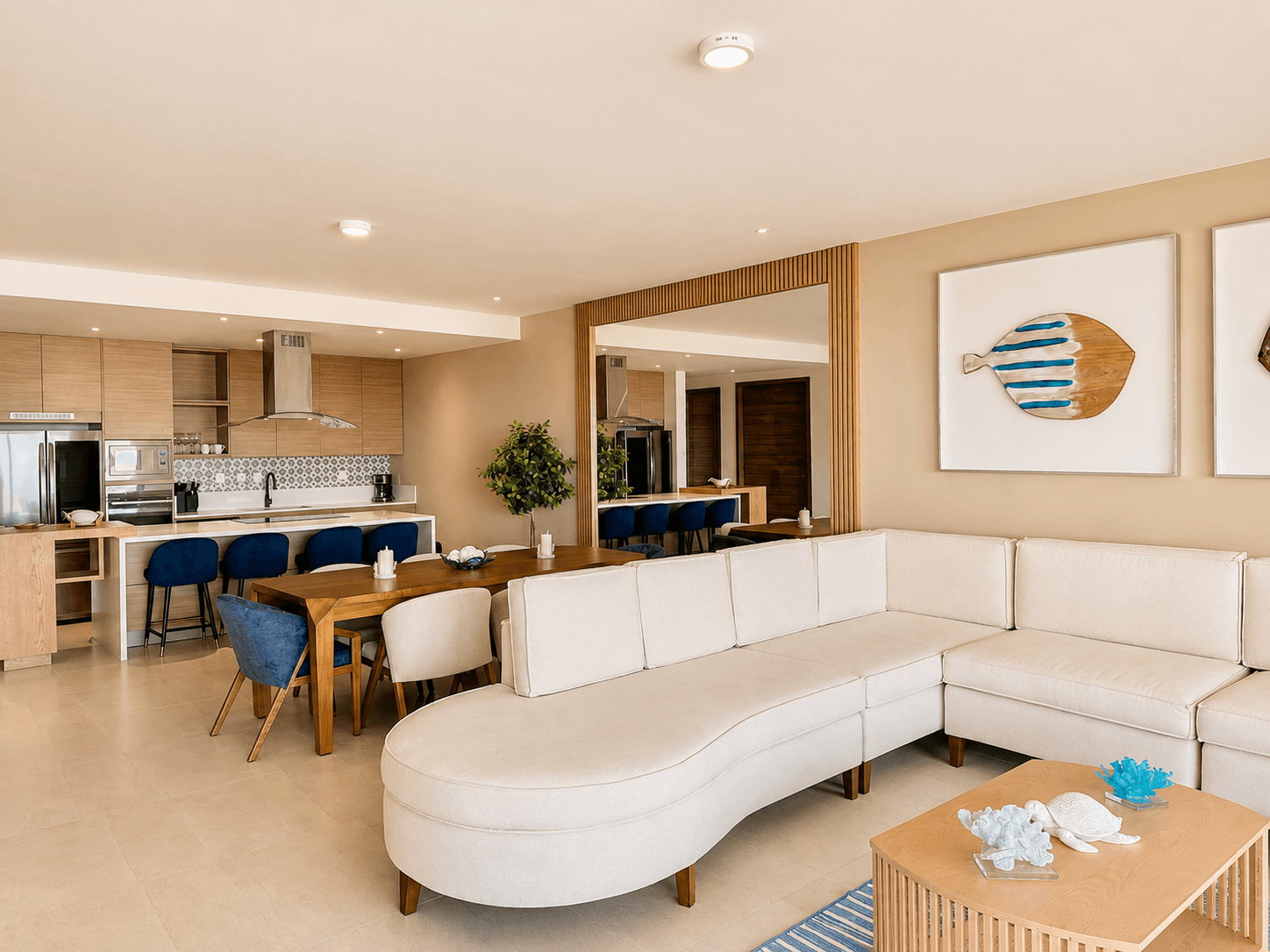 Living room, dining area, and kitchen with modern finishes.