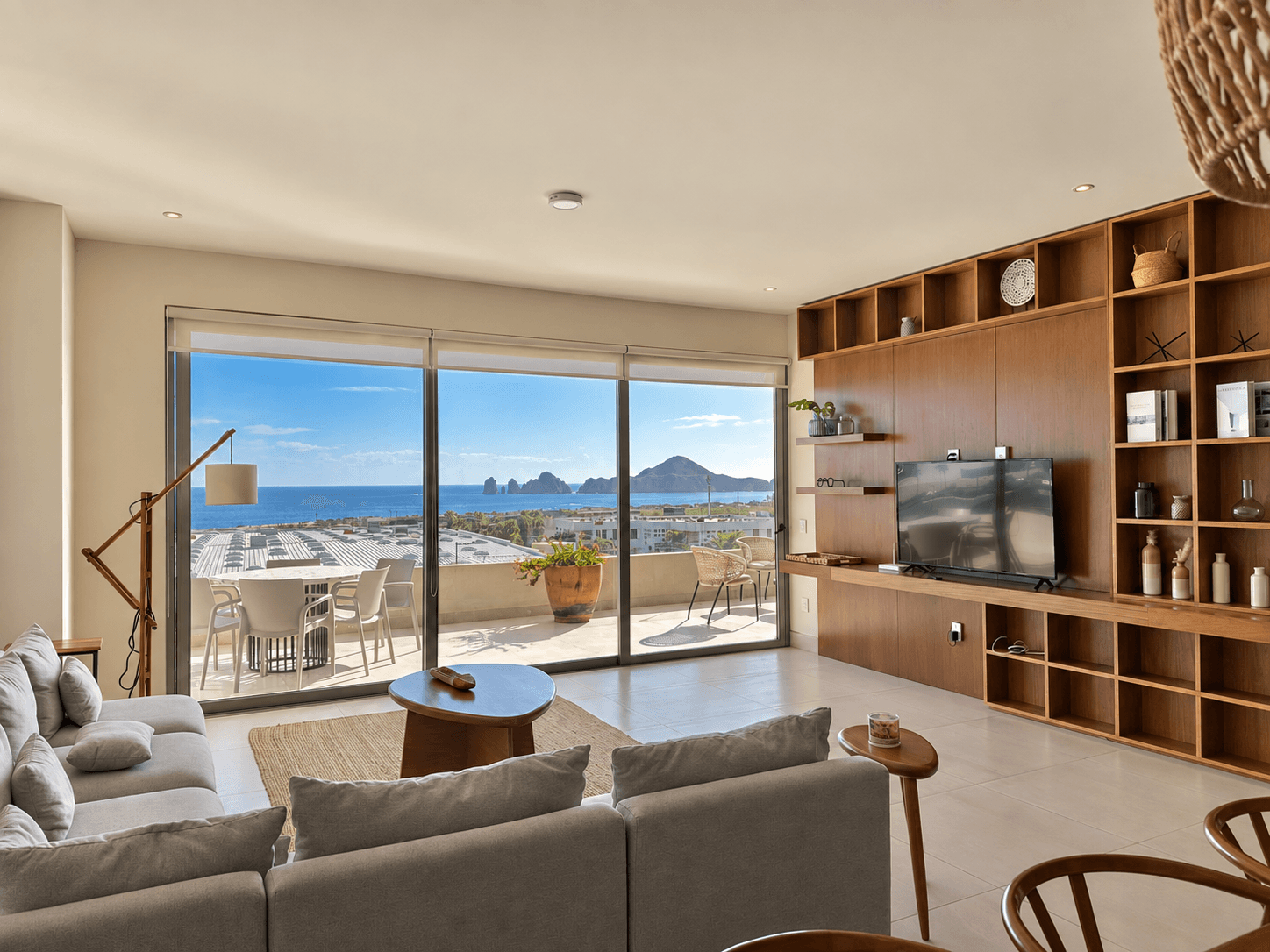 Living room with panoramic ocean view and views of El Arco.